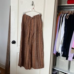 3/$30 EUC H&M animal print like flowy pants in size US 4